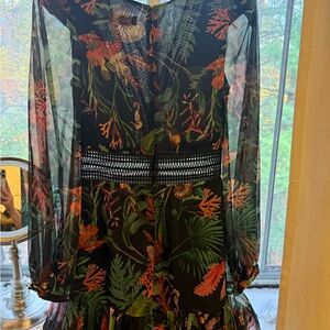 PatBO Elegant Black Dress with Vibrant Floral Design